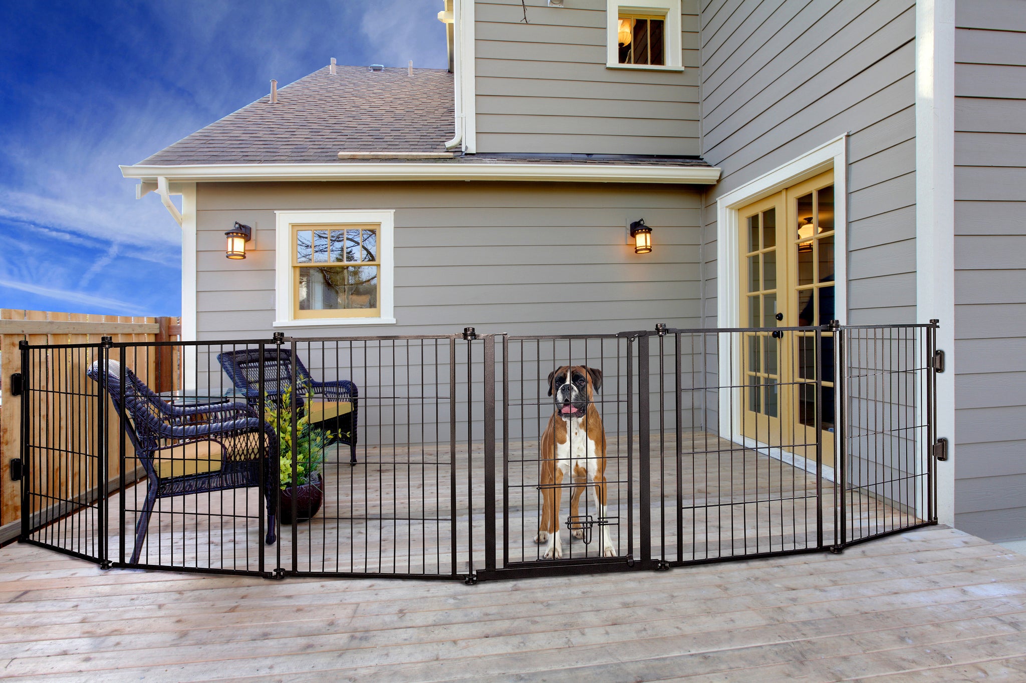 The Carlson Outdoor Super Wide Pet Pen & Gate is a versatile black steel gate with six 32” panels, expanding up to 144” wide. It features a walk-through door with a lever-style handle, a sliding safety lock, and a small pet door. Perfect for keeping pets safe outdoors, it’s weather-resistant and easy to store.