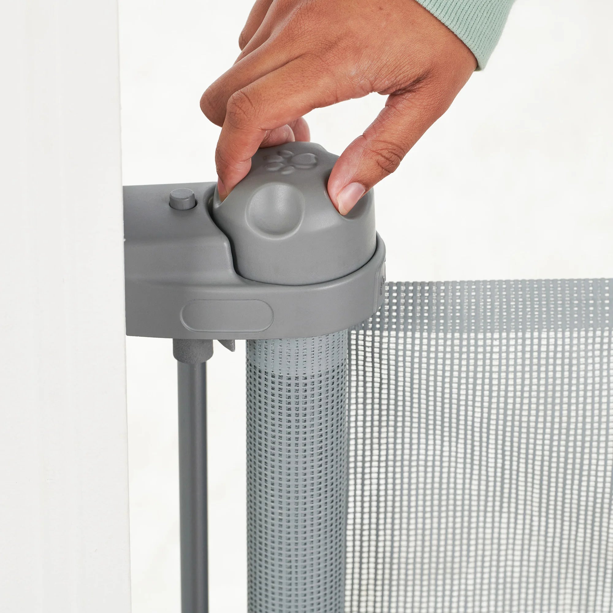 The Carlson Retractable Pet Gate expands up to 50" wide, stands 30" tall, and features a high-quality mesh barrier for pet safety.