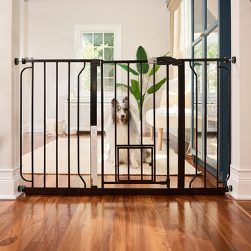 The Carlson 51” Extra Wide Walk-Thru Pet Gate features a sturdy all-steel frame, a 16.5" wide walk-through door, and a patented small pet door. It expands from 29” to 51” wide, stands 30” tall, and includes extensions for wider openings. Ideal for doorways, hallways, and stairs, offering easy installation.