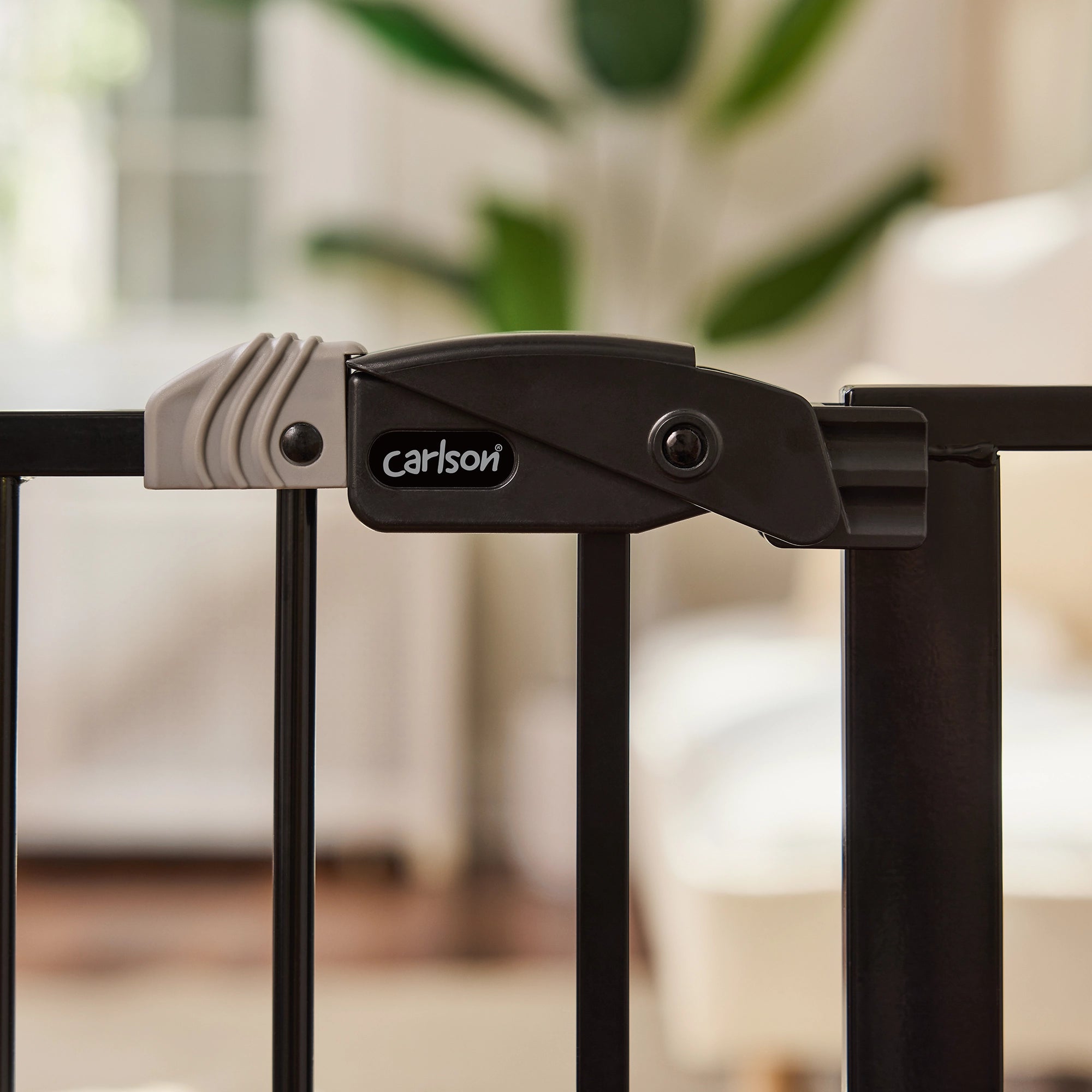 The Carlson 51” Extra Wide Walk-Thru Pet Gate features a sturdy all-steel frame, a 16.5" wide walk-through door, and a patented small pet door. It expands from 29” to 51” wide, stands 30” tall, and includes extensions for wider openings. Ideal for doorways, hallways, and stairs, offering easy installation.