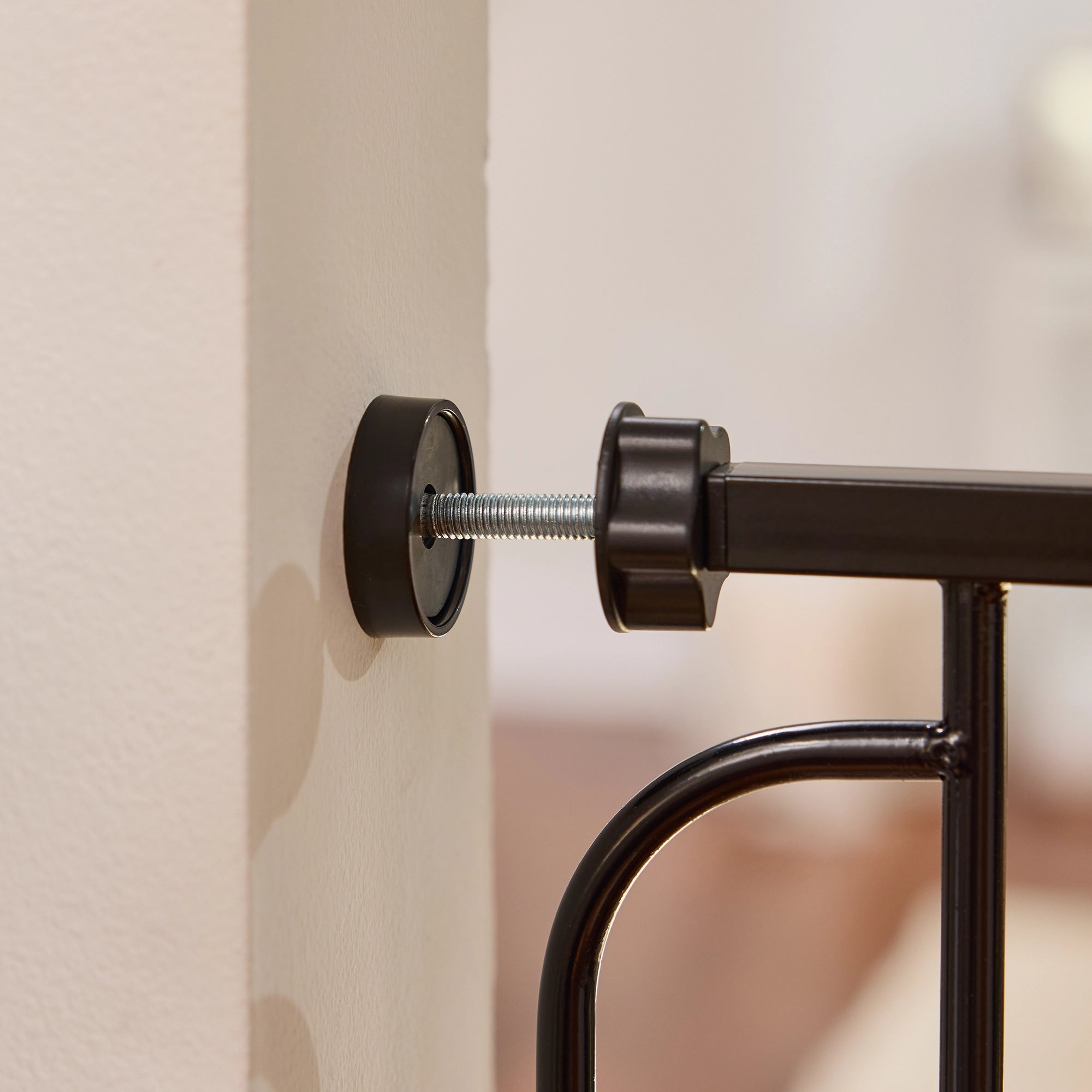 The Carlson 51” Extra Wide Walk-Thru Pet Gate features a sturdy all-steel frame, a 16.5" wide walk-through door, and a patented small pet door. It expands from 29” to 51” wide, stands 30” tall, and includes extensions for wider openings. Ideal for doorways, hallways, and stairs, offering easy installation.
