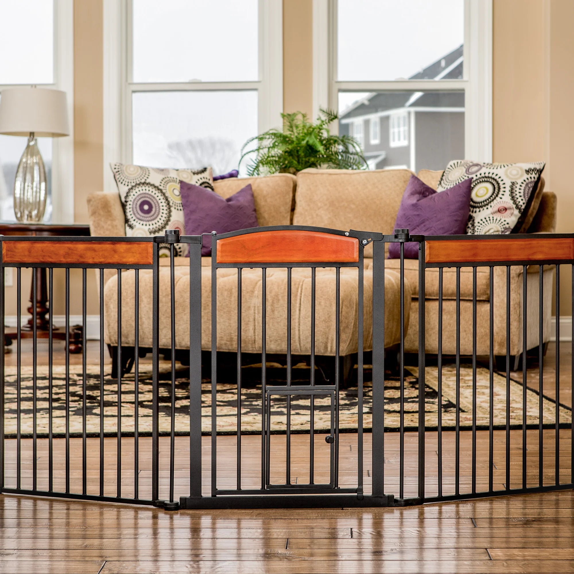 The Design Paw Flexi Walk-Thru Pet Gate in a living room.