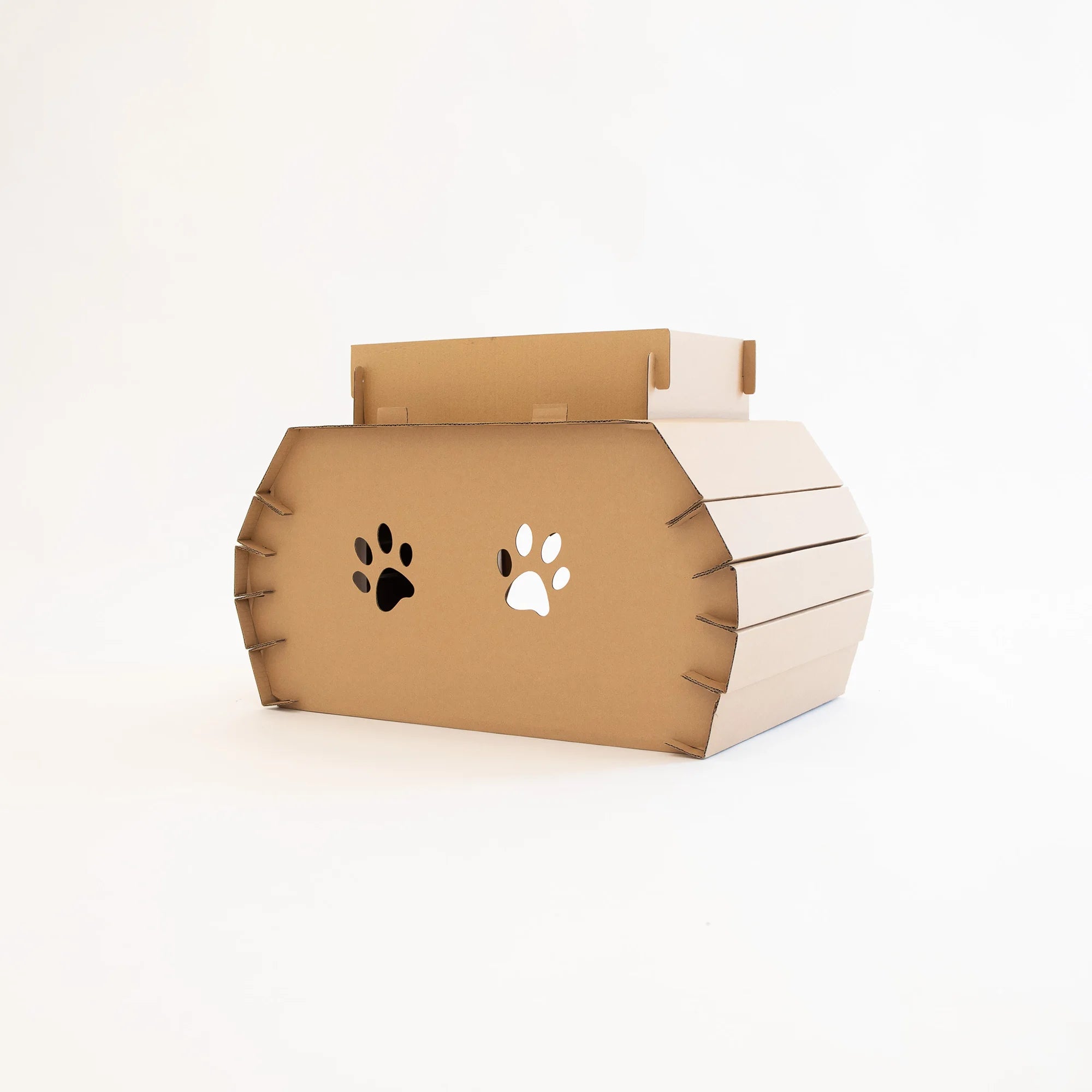 The Carlson Cat Camper and Scratcher is a compact, eco-friendly playhouse made from durable cardboard. Featuring a cat door, three paw-shaped windows, and a removable scratcher, it provides a cozy, entertaining space for small animals like cats and rabbits. Easy to assemble and lightweight for easy transport.