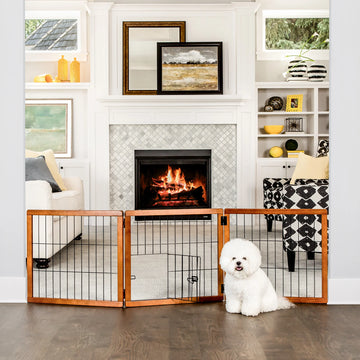 A wooden pet gate with a black metal frame, featuring three panels that fold for easy storage. It stands 20 inches tall, adjusts from 22 to 62 inches wide, and includes a small pet door for dogs to pass through. Ideal for hallways, doorways, or stairs, and requires no permanent installation.