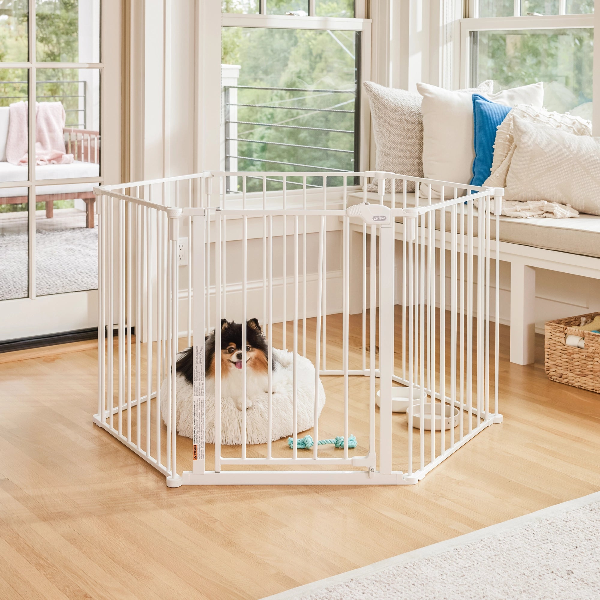 The Carlson Convertible Pet Yard is a versatile, chew-proof pet enclosure with all-steel construction. It features adjustable hinged posts, expanding from 52” to 146.5” wide. Standing 28” tall, it includes a walk-through door with a slide handle, offering a flexible and secure space for pets at home.