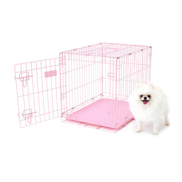 The Carlson Small Single-Door Dog Crate in pink is a durable steel wire kennel measuring 24” L x 18” W x 20.5” H. It features a multi-point locking system, a front door for easy access, and a removable bottom pan for easy cleaning. The crate folds nearly flat for convenient travel and storage. Ideal for small dogs.
