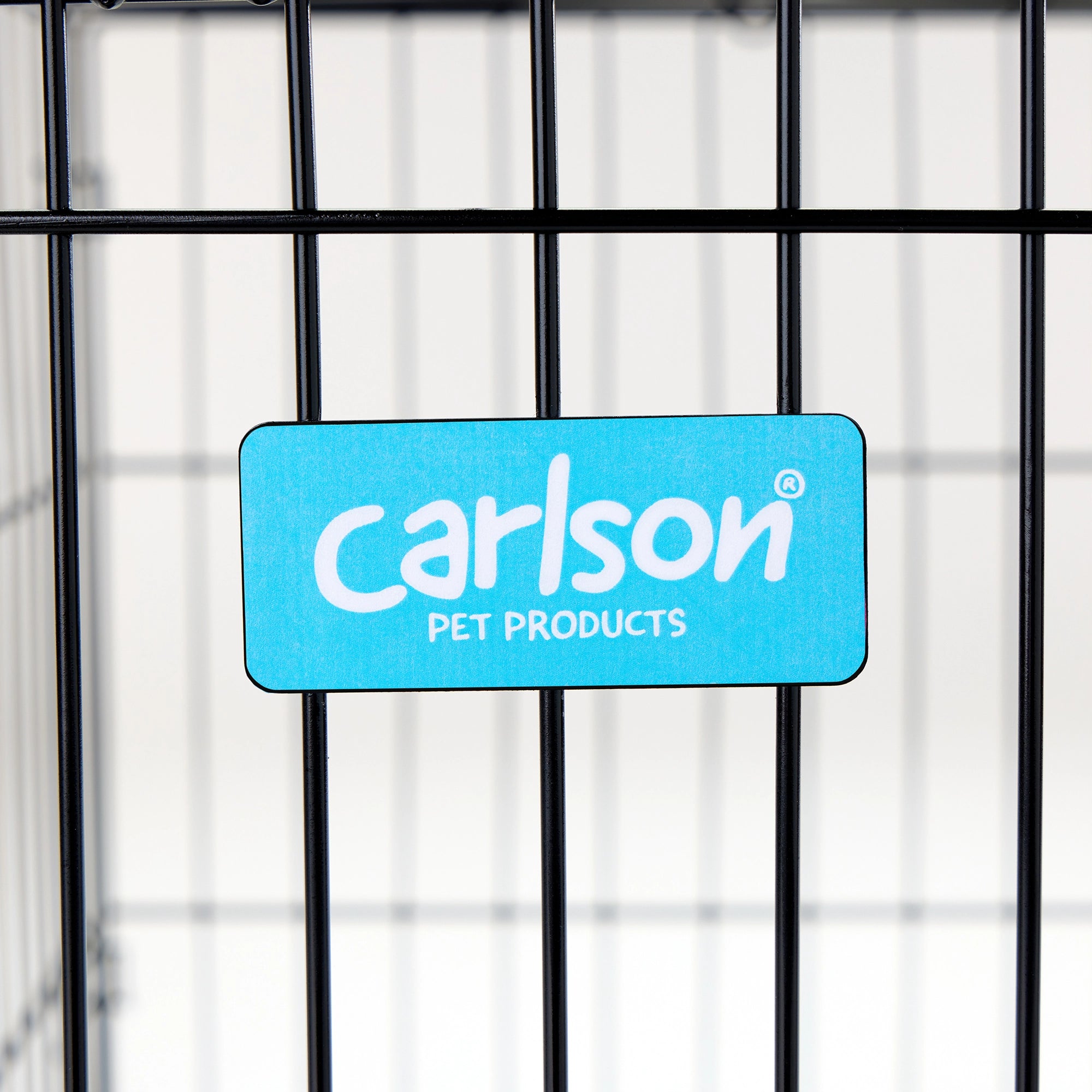 The Carlson Large Double-Door Dog Crate is a durable and portable steel wire crate designed for medium to large dogs. It features two access doors, a multi-point locking system, a removable bottom pan for easy cleaning, and a divider to adjust the space as your puppy grows. Ideal for travel and home use.