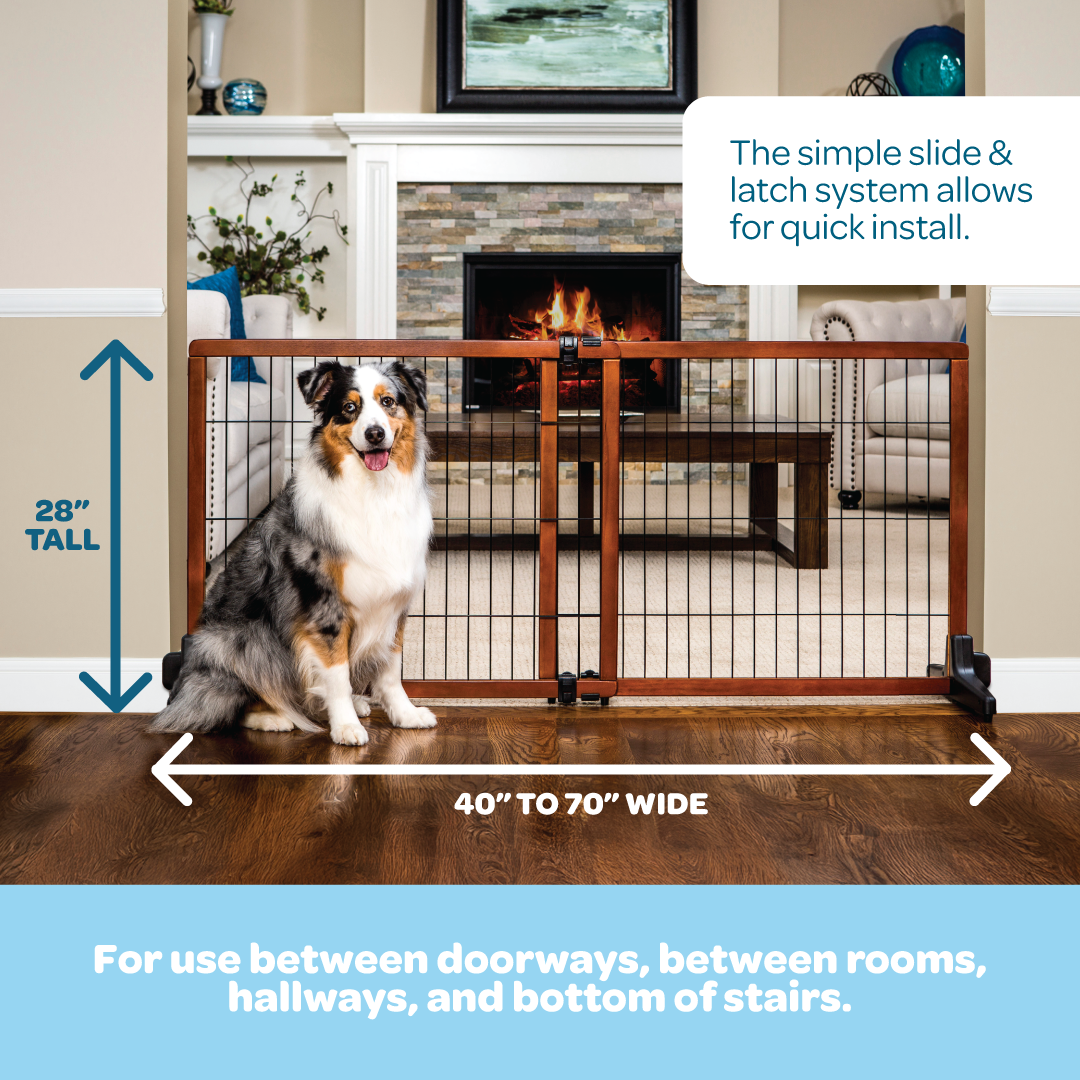 The Carlson Design Paw Extra Tall Extra Wide Freestanding Pet Gate features a durable wood frame with black steel accents, expanding from 40” to 70” in width. Standing 28” tall, it’s perfect for small pets, offering a non-permanent, easy-to-use solution to manage pet access in your home.