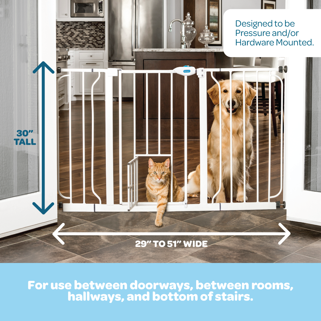 The Carlson 51” Extra Wide Walk-Thru Pet Gate in white features a small pet door, chew-proof steel construction, and expandable design. Easy to install, it fits openings from 29” to 51” wide and includes 6” and 12” extensions, offering flexibility for various spaces while keeping your pets secure.