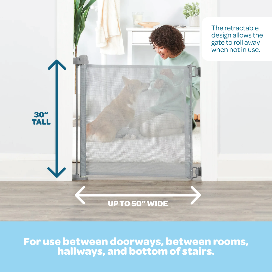 The Carlson Retractable Pet Gate expands up to 50" wide, stands 30" tall, and features a high-quality mesh barrier for pet safety.
