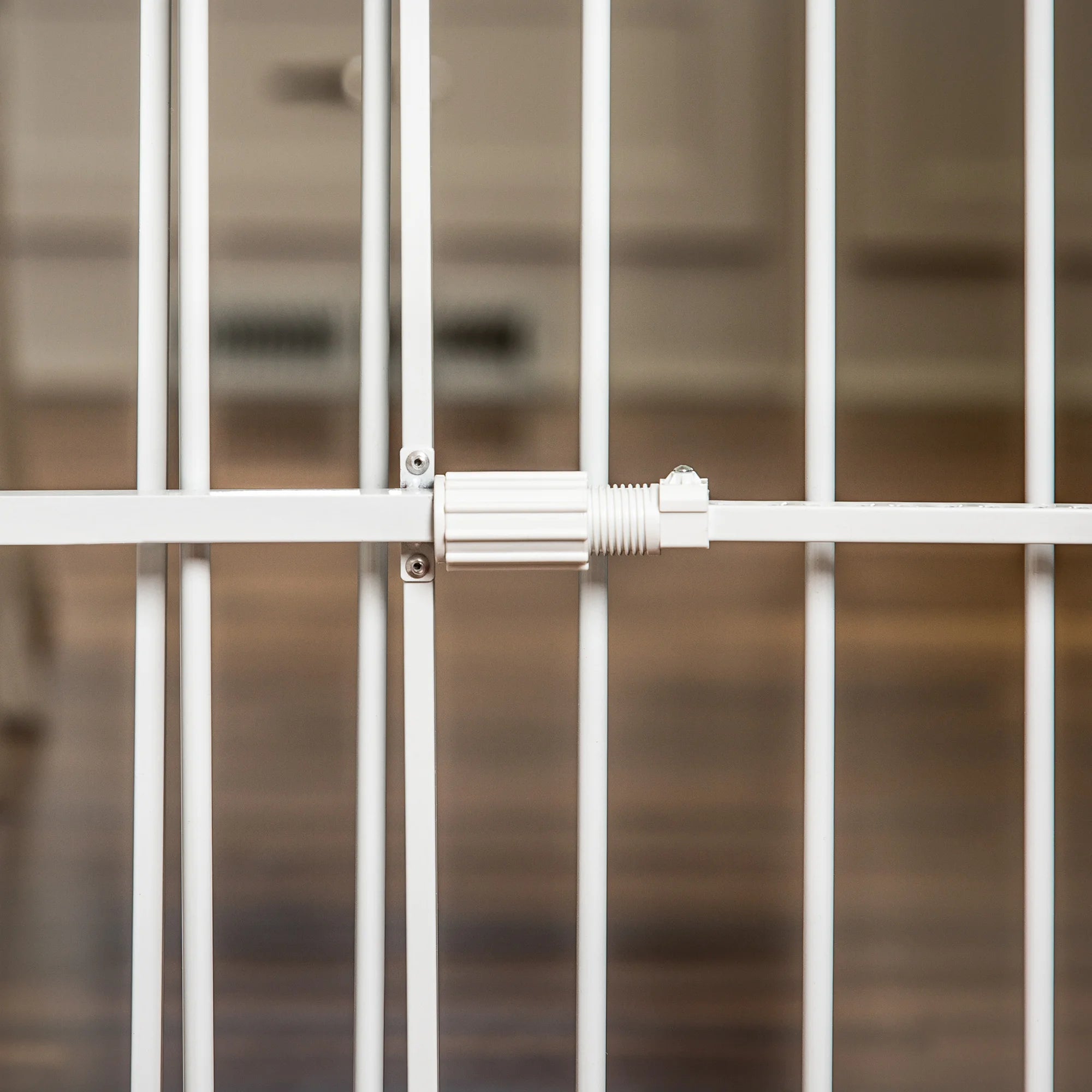The Carlson Big Tuffy® Expandable Pet Gate in white is a sturdy, 32" tall steel gate designed to fit openings from 22" to 38". It features a pressure-mount system for quick, tool-free installation, rubber bumpers to protect walls, and a patented small pet door for easy access, making it perfect for small to large pets.