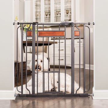 Design Paw Extra Tall Walk-Thru Pet Gate in kitchen with a dog sitting behind it.