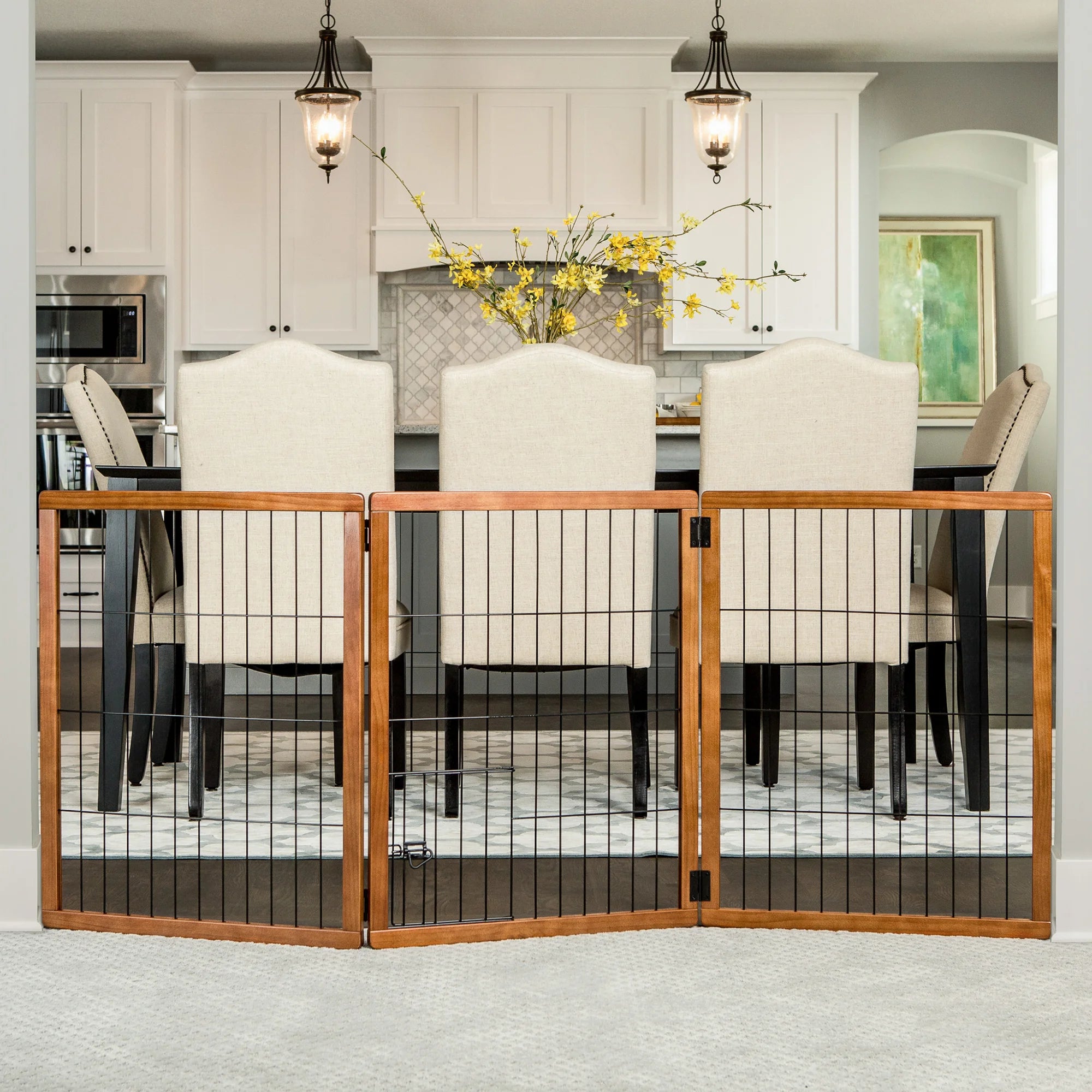 Design Paw Tall 3 Panel Wooden Pet Gate set up in a dining room.