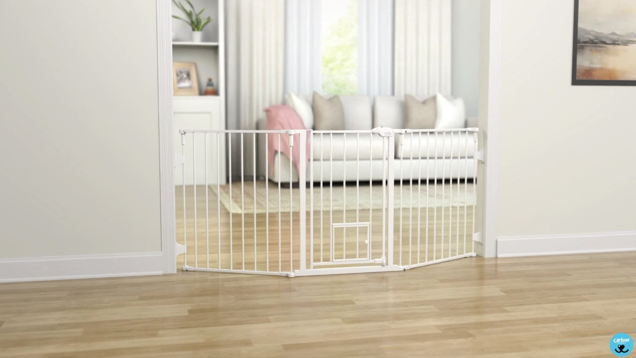 Carlson Flexi Walk-Thru Pet Gate with Small Pet Door, designed for active pets and irregular spaces. Features a sturdy all-steel frame, accordion-style design, and a 16.3" wide walk-through door. Includes a small pet door, easy-to-use sliding lock, and wall-mounting hardware for secure installation.